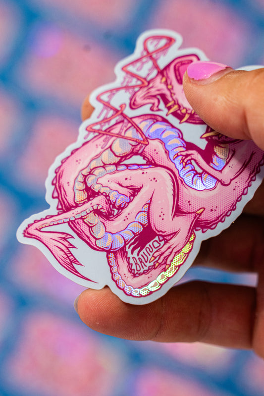 Dragon Débile Boutique Art de Brunograffer - Illustration digitale imprimée sur stickers résistant aux poussières et aux éclaboussures.Sticker Vinyle brillant avec effet holographique.
Une illustration digital réalisé sur tablette iPad avec Procreate puis imprimée. Les autocollants sont résistant aux poussières et aux éclaboussures. Veillez bien à les coller sur une surface lisse, propre et sèche pour un bon maintient. Par exemple sur un casque, un vélo, un frigo, une porte, le dos d'un téléphone, etc.
Matériaux : Sticker Vinyle brillant avec effet holographique.Dimensions : 8 x 5,5 cm
Vendu à l'unité