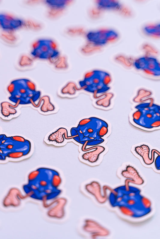 Tentacouilles -Illustration digitale d'une parodie de Pokémon imprimée sur stickers vinyl mat. Une illustration digital réalisé sur tablette iPad avec Procreate puis imprimée. Les autocollants sont résistant aux poussières et aux éclaboussures. Veillez bien à les coller sur une surface lisse, propre et sèche pour un bon maintient. Par exemple sur un casque, un vélo, un frigo, une porte, le dos d'un téléphone, etc. Matériaux : Sticker Vinyle mat.Dimensions : 4,3 x 4,4 cm Vendu à l'unité-Brunograffer Boutique Art de Brunograffer - Illustration digitale d'une parodie de Pokémon imprimée sur stickers vinyl mat.
Une illustration digital réalisé sur tablette iPad avec Procreate puis imprimée. Les autocollants sont résistant aux poussières et aux éclaboussures. Veillez bien à les coller sur une surface lisse, propre et sèche pour un bon maintient. Par exemple sur un casque, un vélo, un frigo, une porte, le dos d'un téléphone, etc.
Matériaux : Sticker Vinyle mat.Dimensions : 4,3 x 4,4 cm
 
Vendu à l'unité