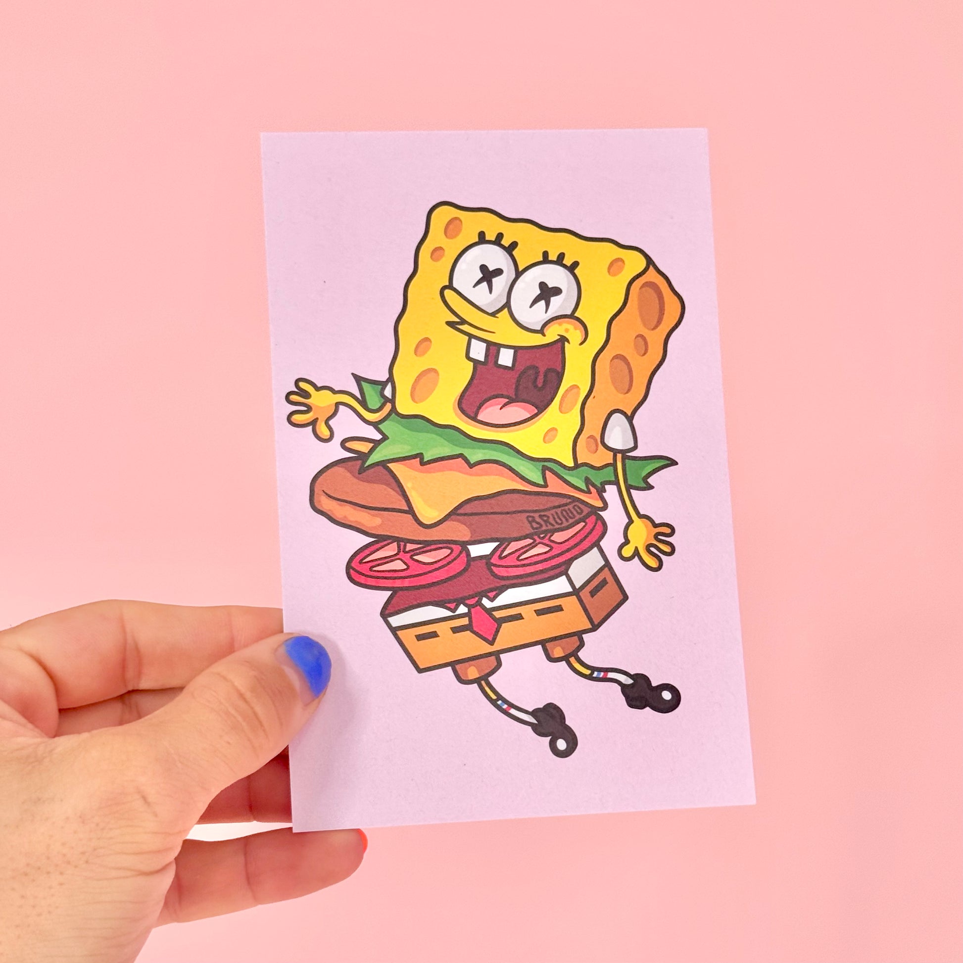 Carte postale Bob l’Éponge Burger -Carte postale imprimée d’une illustration digitale.Imprimée sur un papier 300g recyclé. Possibilité de la faire signer et dédicacer à la main en choisissant l'option de livraison "Dédicacée".-Brunograffer