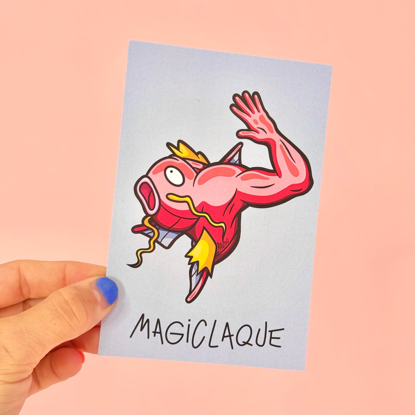 Carte postale Magiclaque -Carte postale imprimée d’une illustration digital d’une parodie de PokémonImprimée sur un papier 300g recyclé. Possibilité de la faire signer et dédicacer à la main en choisissant l'option de livraison 