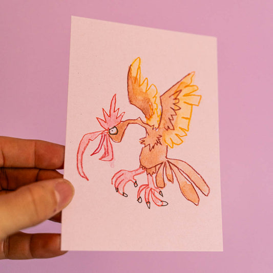Carte postale imprimée d’une illustration réalisée à l'aquarelle et aux crayons de couleurs.Le dessin vient d'un challenge en live sur Twitch dans lequel j'ai dessiné les 151 Pokémon de la première génération de 1995 en 24h en live sur Twitch, MAIS : en moche !
 
 
Voir la vidéo : https://youtu.be/0MyLD5bqc1Q
 
Papier 300g recyclé.
Possibilité de la faire signer et dédicacer à la main en choisissant l'option de livraison 