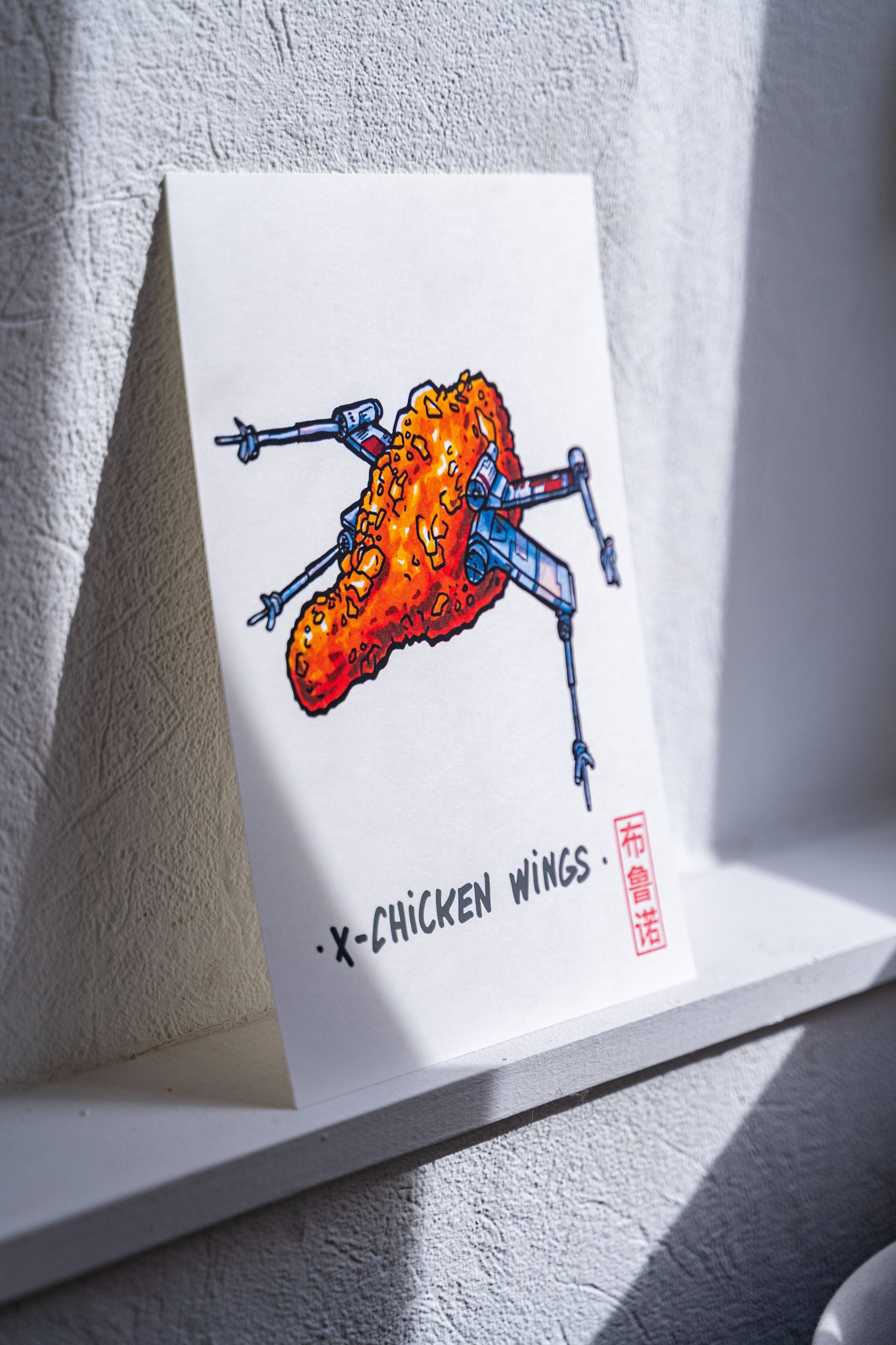 X-Chicken Wings -Illustration imprimée sur papier épais 300g.La version poster est tamponnée à la main.-Brunograffer